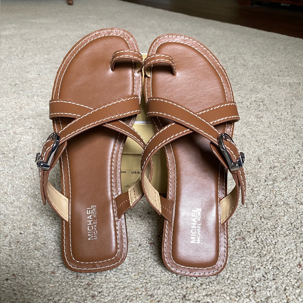 BN never worn Michael Kors Ashton Flat Thong, size 9.5